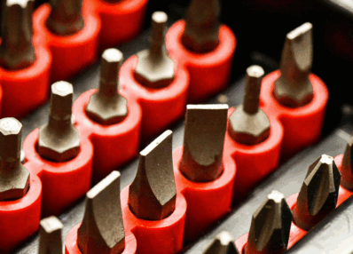 What is a drill bit and what are its types?